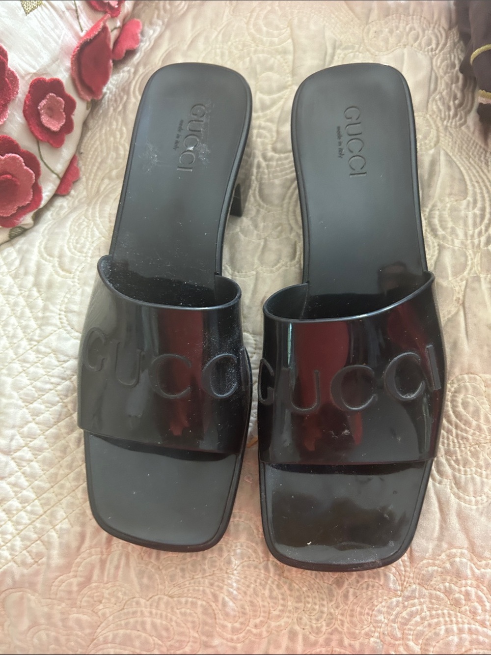 Gucci Black Patent Embossed Slide Mules.